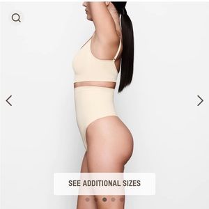 SKIMS SEAMLESS SCULPT HIGH-WAISTED THONG | SAND